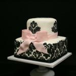 Most damask designs are avialable on fondant coverd cakes.  can be recreated in any colors 